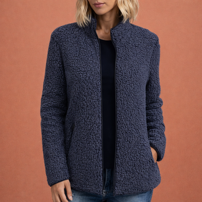 Marineblauw dames fleece vest met hoge kraag en ritssluiting, ideaal voor dagelijks gebruik en koelere dagen.

Zwart