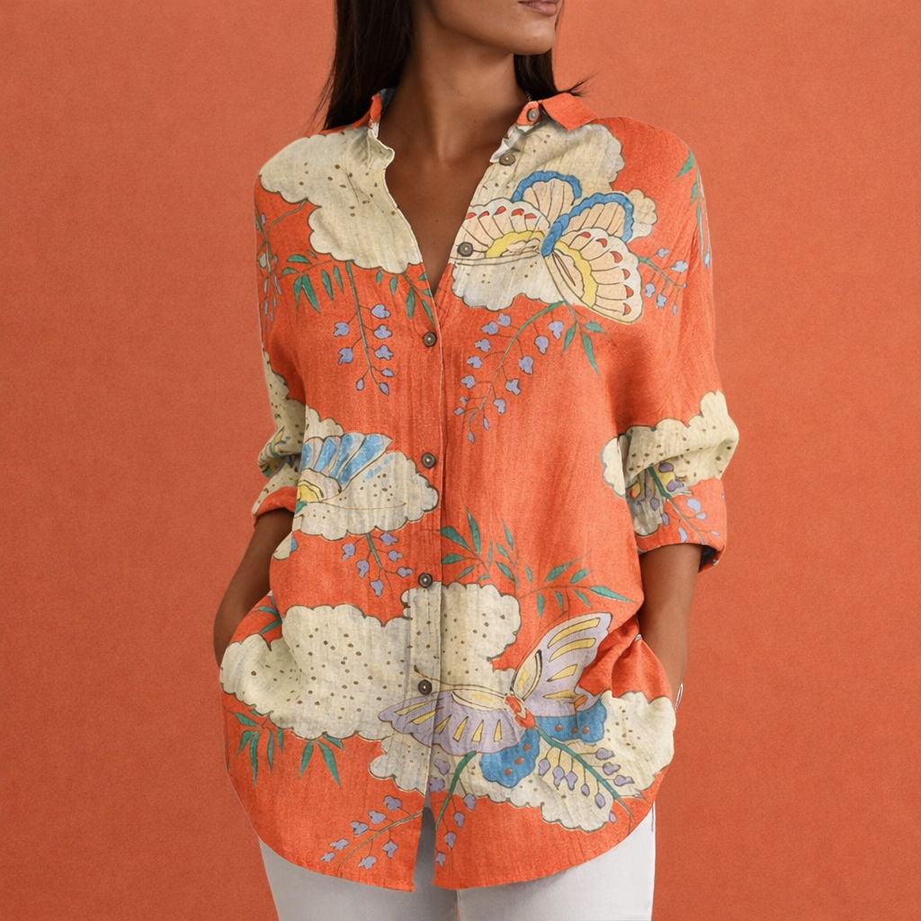 Dames blouse in oranje met minimalistisch design, zacht en comfortabel voor casual en stijlvolle outfits.