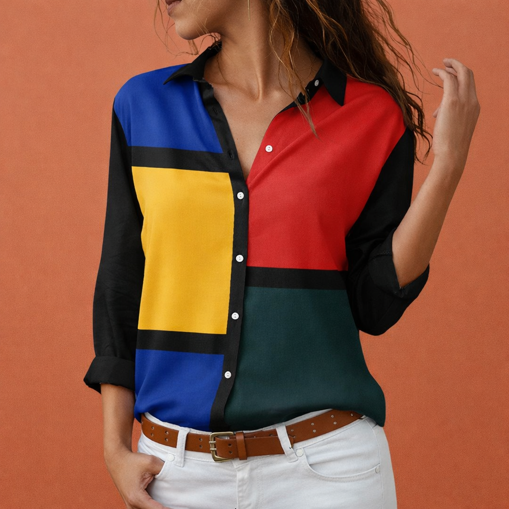 Dames blouse in oranje met minimalistisch design, zacht en comfortabel voor casual en stijlvolle outfits.