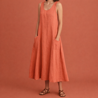 Dames maxi zomerjurk in oranje met minimalistisch design, zacht en comfortabel voor casual en stijlvolle outfits.
