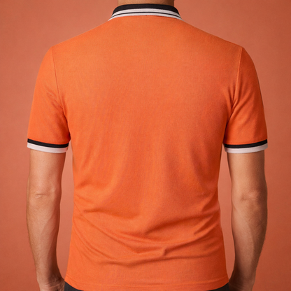 Herenpolo in oranje met stijlvol effen design, zacht en comfortabel voor casual en verzorgde outfits.