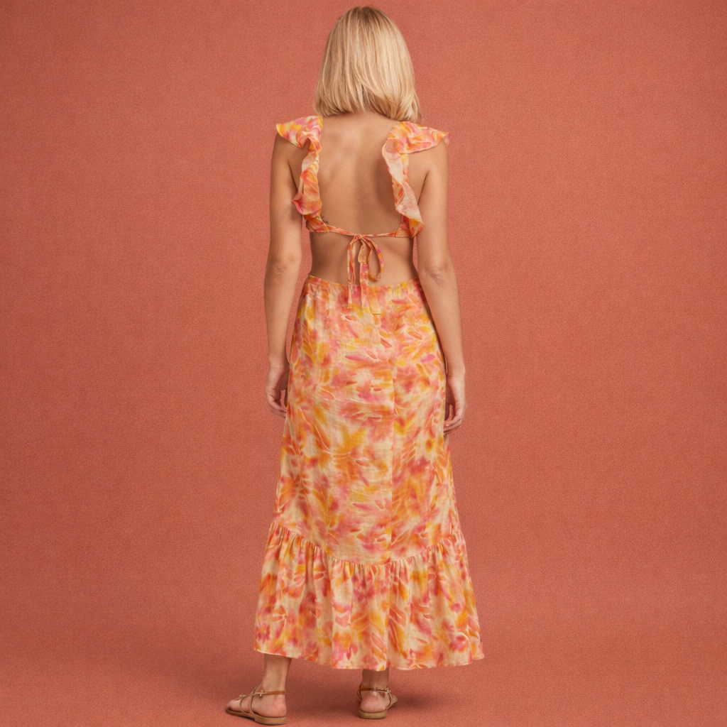 Oranje maxi-jurk voor dames met ruches en bloemenpatroon, perfect voor zomerse dagen en casual gelegenheden.