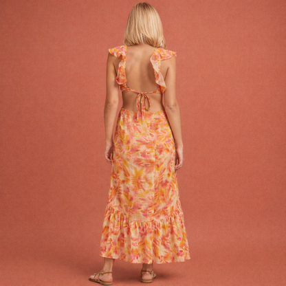 Oranje maxi-jurk voor dames met ruches en bloemenpatroon, perfect voor zomerse dagen en casual gelegenheden.