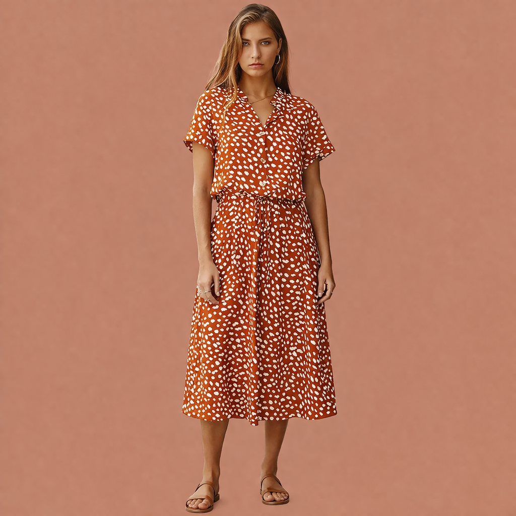 Dames midi jurk in oranje rood met minimalistisch design, zacht en comfortabel voor casual en stijlvolle outfits.