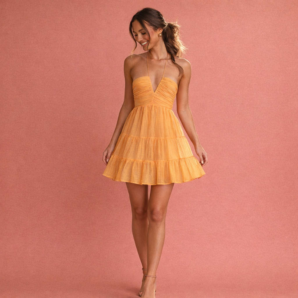 Oranje zomer babydoll jurk voor dames met een luchtige pasvorm, ideaal voor zonnige dagen en casual momenten.