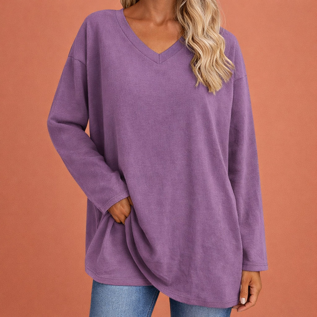 Dames tuniek in paars met minimalistisch design, zacht en comfortabel voor casual en stijlvolle outfits.