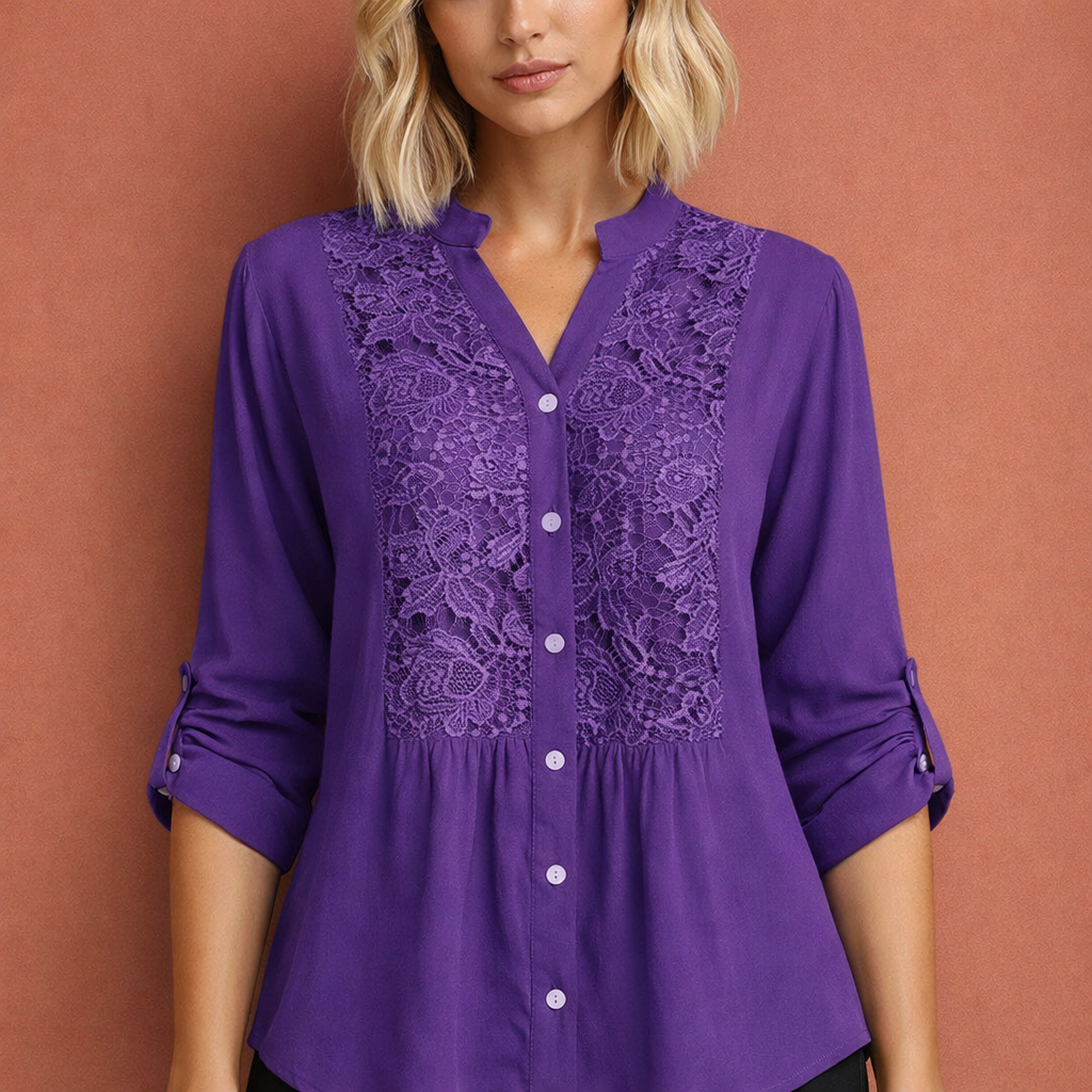 Dames tuniekblouse in paars met minimalistisch design, zacht en comfortabel voor casual en stijlvolle outfits.