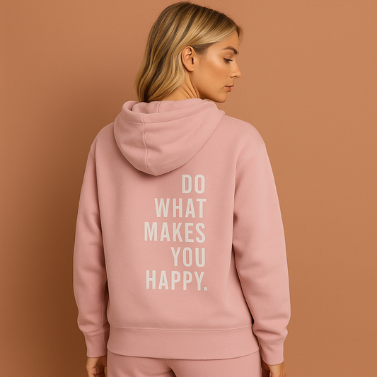 Pastelroze dames hoodie met de tekst “Do What Makes You Happy”, ideaal voor casual outfits en relaxmomenten.