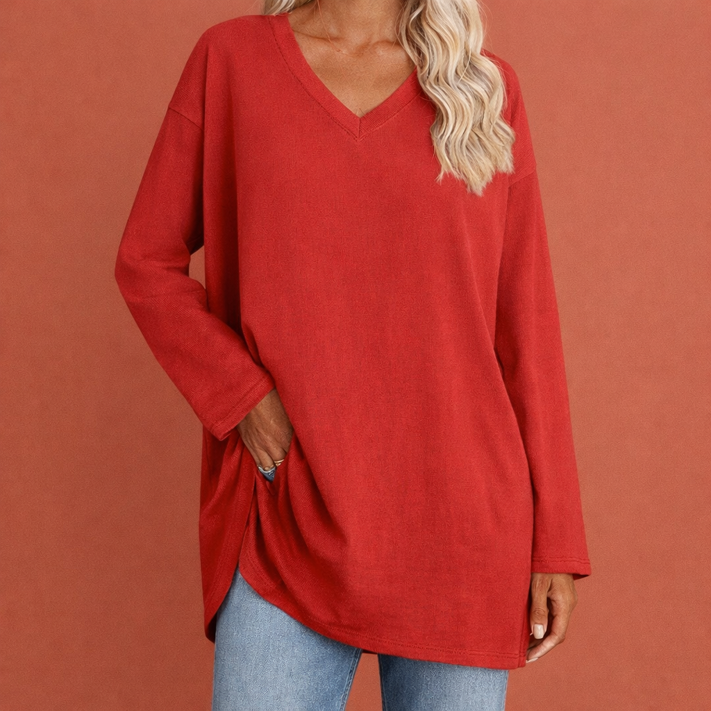 Dames tuniek in rood met minimalistisch design, zacht en comfortabel voor casual en stijlvolle outfits.