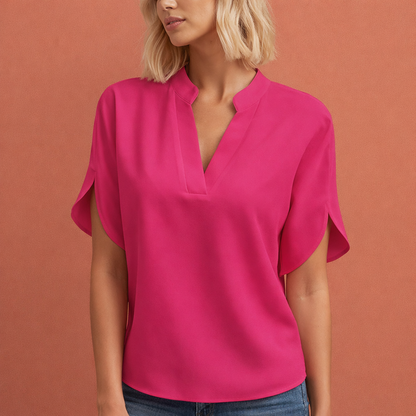 Dames blouse in roze met minimalistisch design, zacht en comfortabel voor casual en stijlvolle outfits.