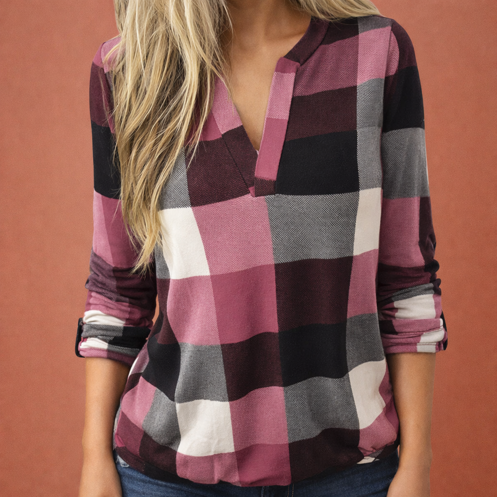Dames blouse in roze met minimalistisch design, zacht en comfortabel voor casual en stijlvolle outfits.