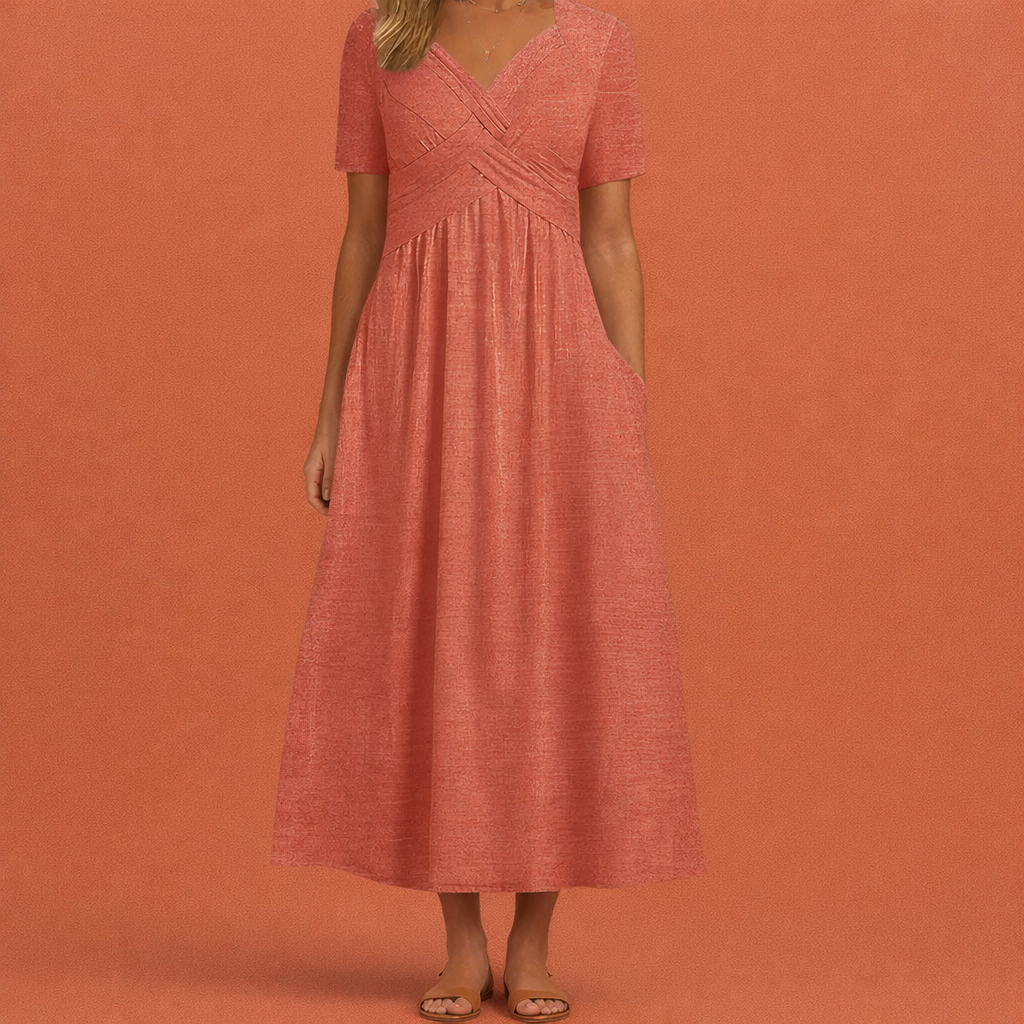 Dames maxi zomerjurk in roze met minimalistisch design, zacht en comfortabel voor casual en stijlvolle outfits.