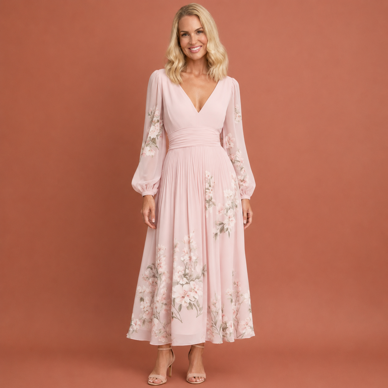 Dames midi jurk in roze met minimalistisch design, zacht en comfortabel voor casual en stijlvolle outfits.