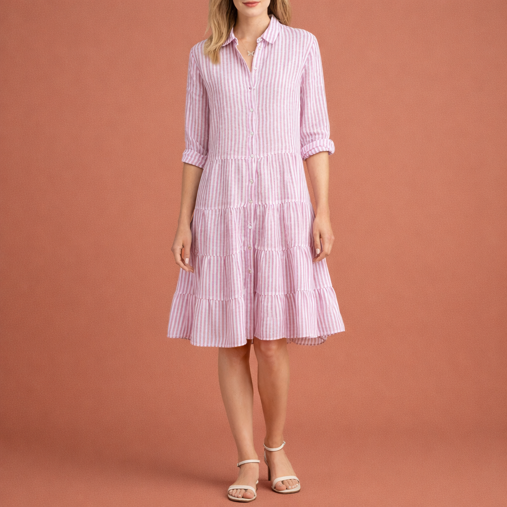 Dames midi zomerjurk in roze met minimalistisch design, zacht en comfortabel voor casual en stijlvolle outfits.