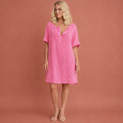 Dames tunic jurk in roze met minimalistisch design, zacht en comfortabel voor casual en stijlvolle outfits.