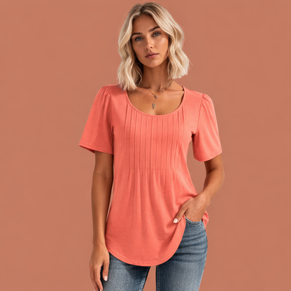 Dames zomer top in roze met minimalistisch design, zacht en comfortabel voor casual en stijlvolle outfits.