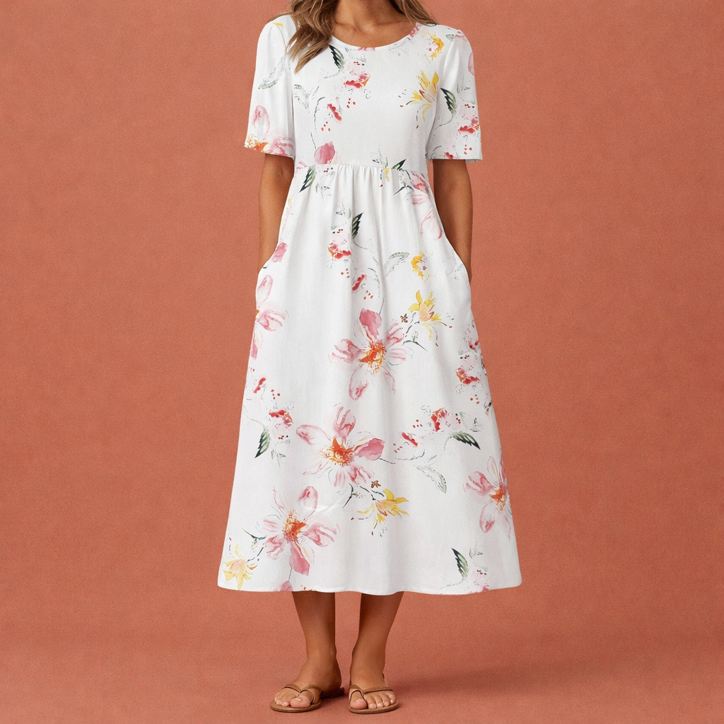 Dames maxi jurk in roze met minimalistisch design, zacht en comfortabel voor casual en stijlvolle outfits.