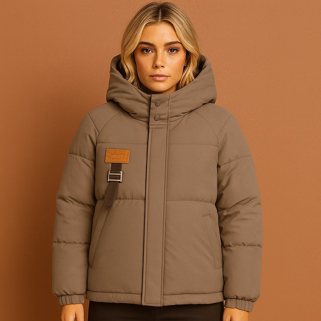 Oversized puffer jas voor dames in taupe kleur met moderne en comfortabele uitstraling voor koude dagen