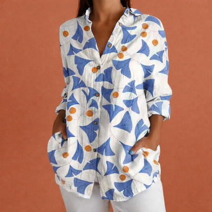 Dames blouse in wit met minimalistisch design, zacht en comfortabel voor casual en stijlvolle outfits.