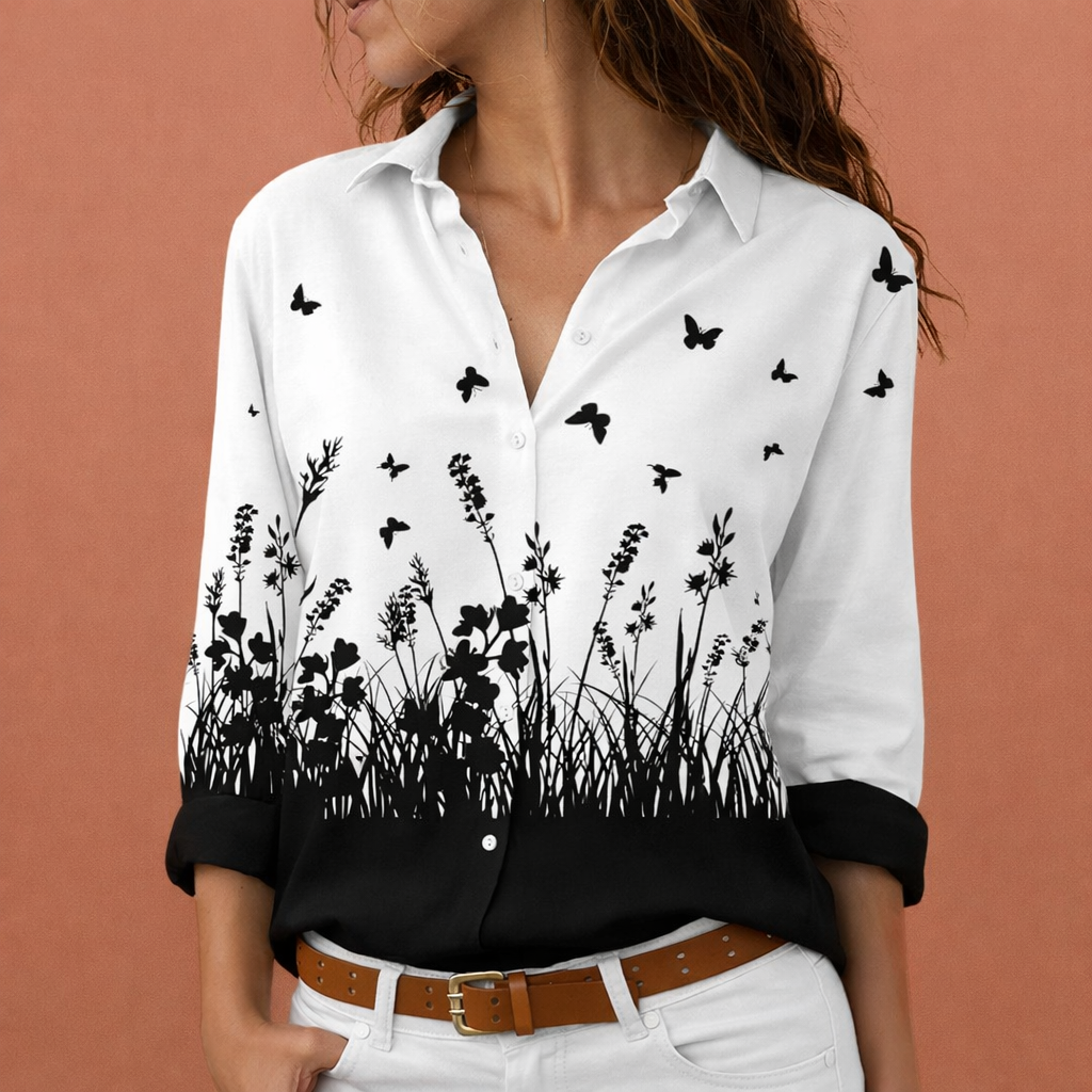 Dames blouse in wit met minimalistisch design, zacht en comfortabel voor casual en stijlvolle outfits.