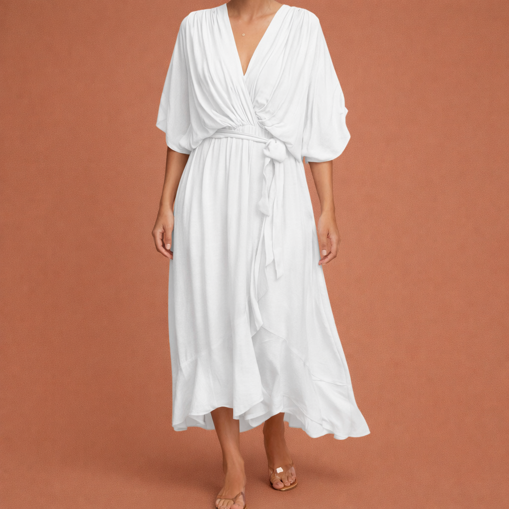Dames maxi jurk in wit met minimalistisch design, zacht en comfortabel voor casual en stijlvolle outfits.