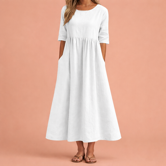 Dames maxi jurk in wit met minimalistisch design, zacht en comfortabel voor casual en stijlvolle outfits.