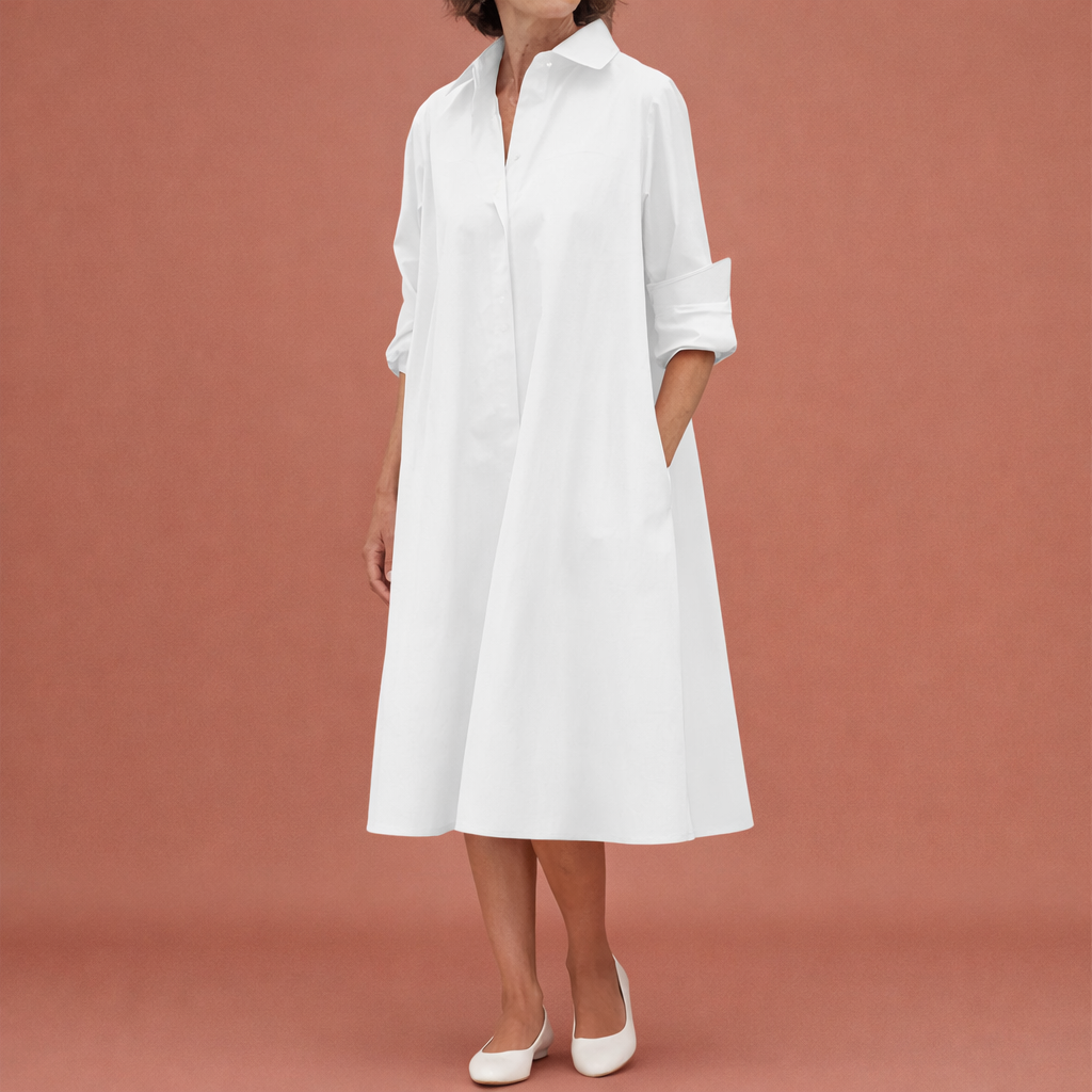 Dames midi blousejurk in wit met minimalistisch design, zacht en comfortabel voor casual en stijlvolle outfits.