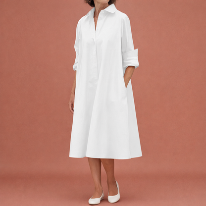 Dames midi blousejurk in wit met minimalistisch design, zacht en comfortabel voor casual en stijlvolle outfits.