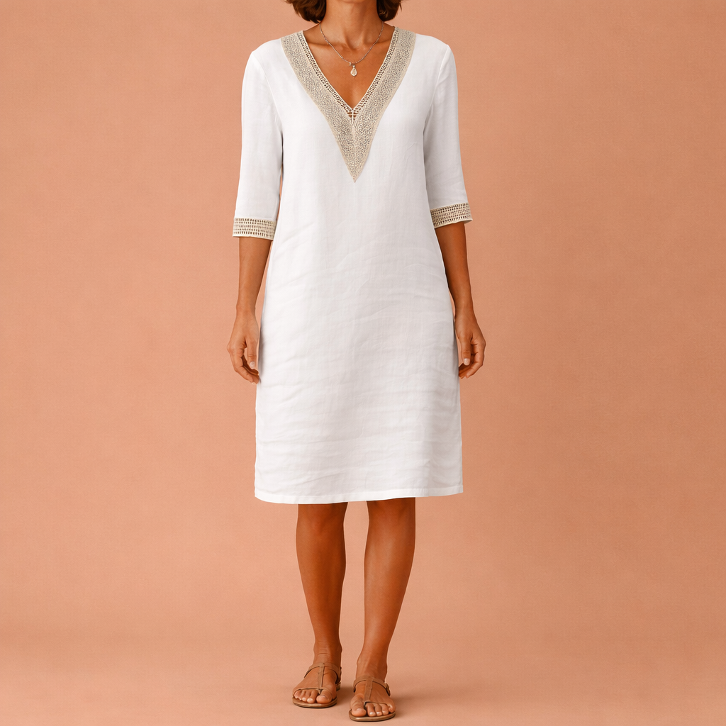 Dames midi jurk in wit met minimalistisch design, zacht en comfortabel voor casual en stijlvolle outfits.