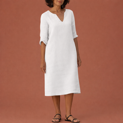 Dames midi zomerjurk in wit met minimalistisch design, zacht en comfortabel voor casual en stijlvolle outfits.
