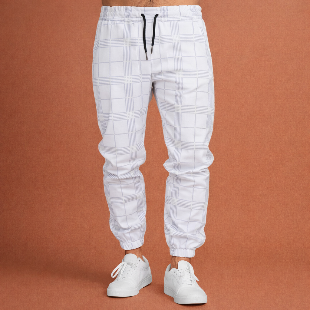 Heren joggingbroek in wit met minimalistisch design, zacht en comfortabel voor casual en stijlvolle outfits.