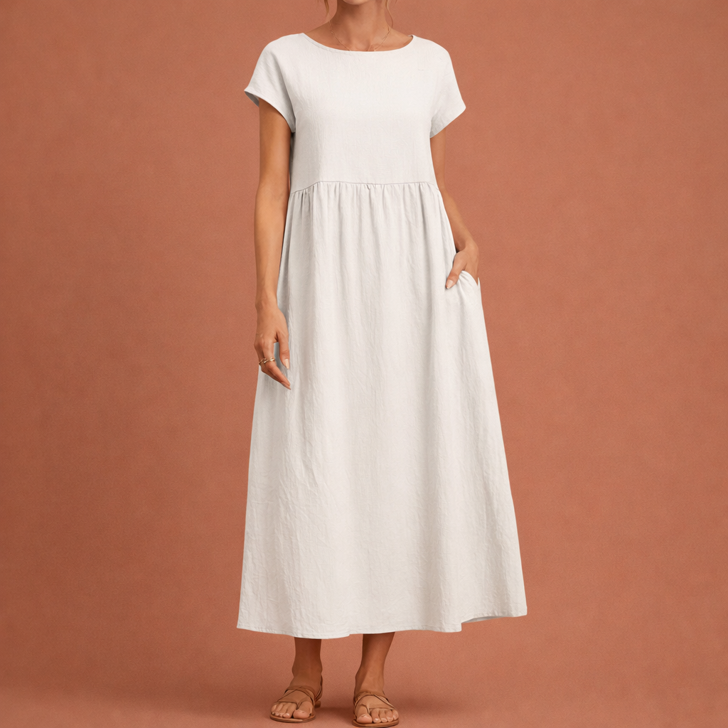 Dames midi jurk in wit met minimalistisch design, zacht en comfortabel voor casual en stijlvolle outfits.