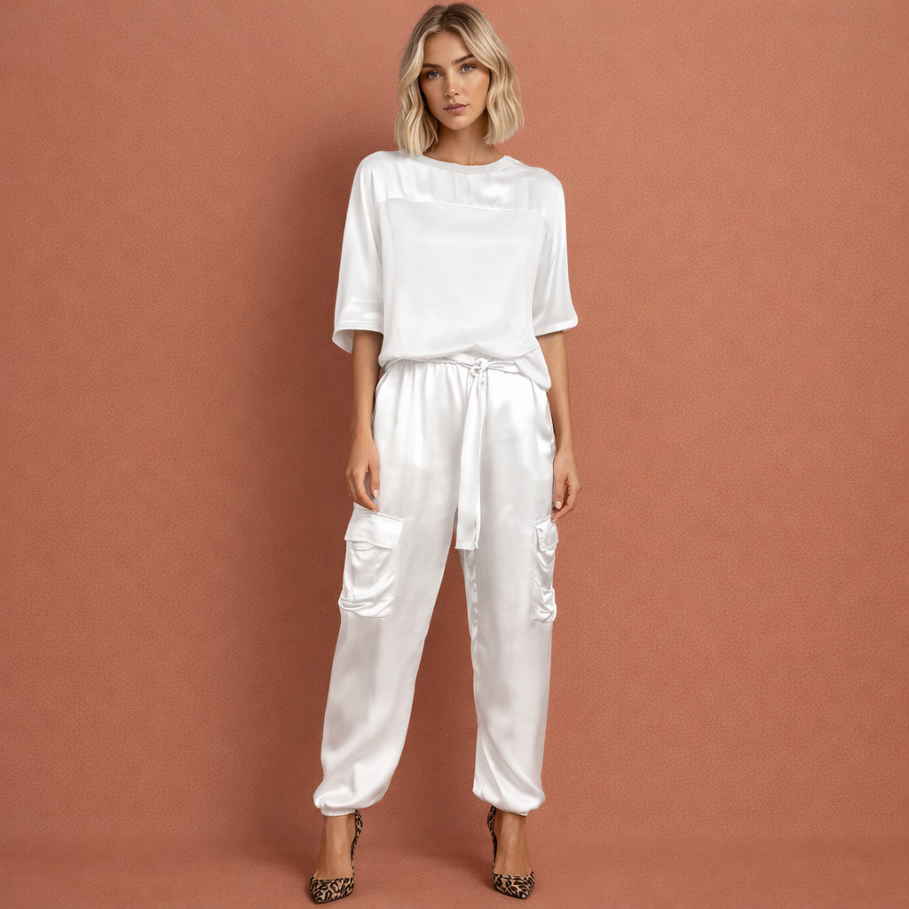 Witte verfijnde elegante set voor dames met een comfortabele pasvorm, ideaal voor chique gelegenheden en stijlvolle outfits.