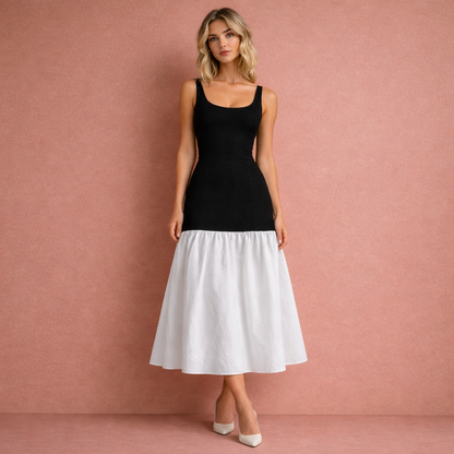 Zwart-witte elegante rimpel maxijurk voor dames, perfect voor feesten en stijlvolle gelegenheden.