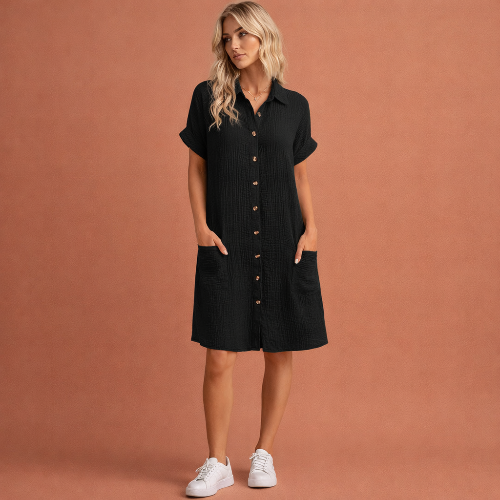 Zwarte casual hemdjurk voor dames met knoopsluiting en luchtige pasvorm, ideaal voor zomerse dagen.
