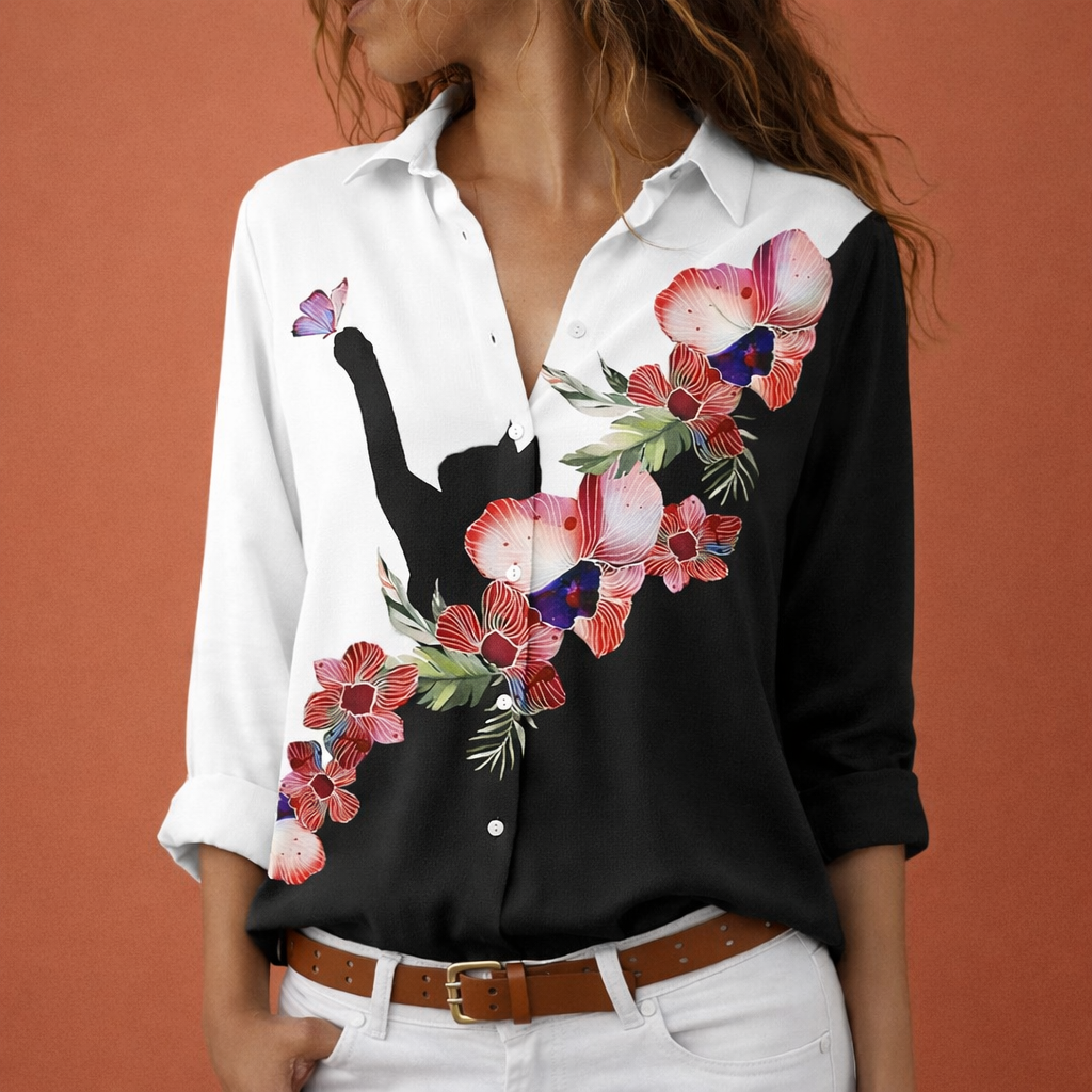 Dames blouse in zwart met minimalistisch design, zacht en comfortabel voor casual en stijlvolle outfits.