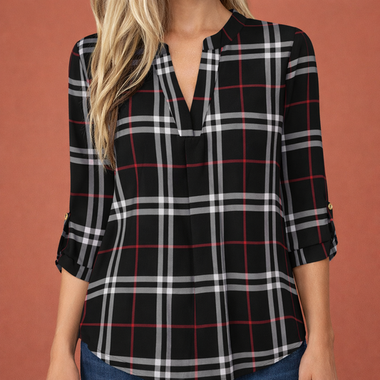 Dames blouse in zwart met minimalistisch design, zacht en comfortabel voor casual en stijlvolle outfits.