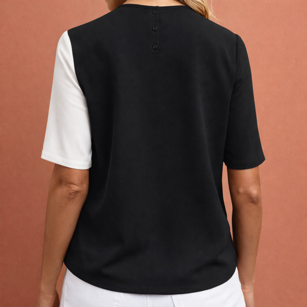 Dames colorblock blouse in zwart met minimalistisch design, zacht en comfortabel voor casual en stijlvolle outfits