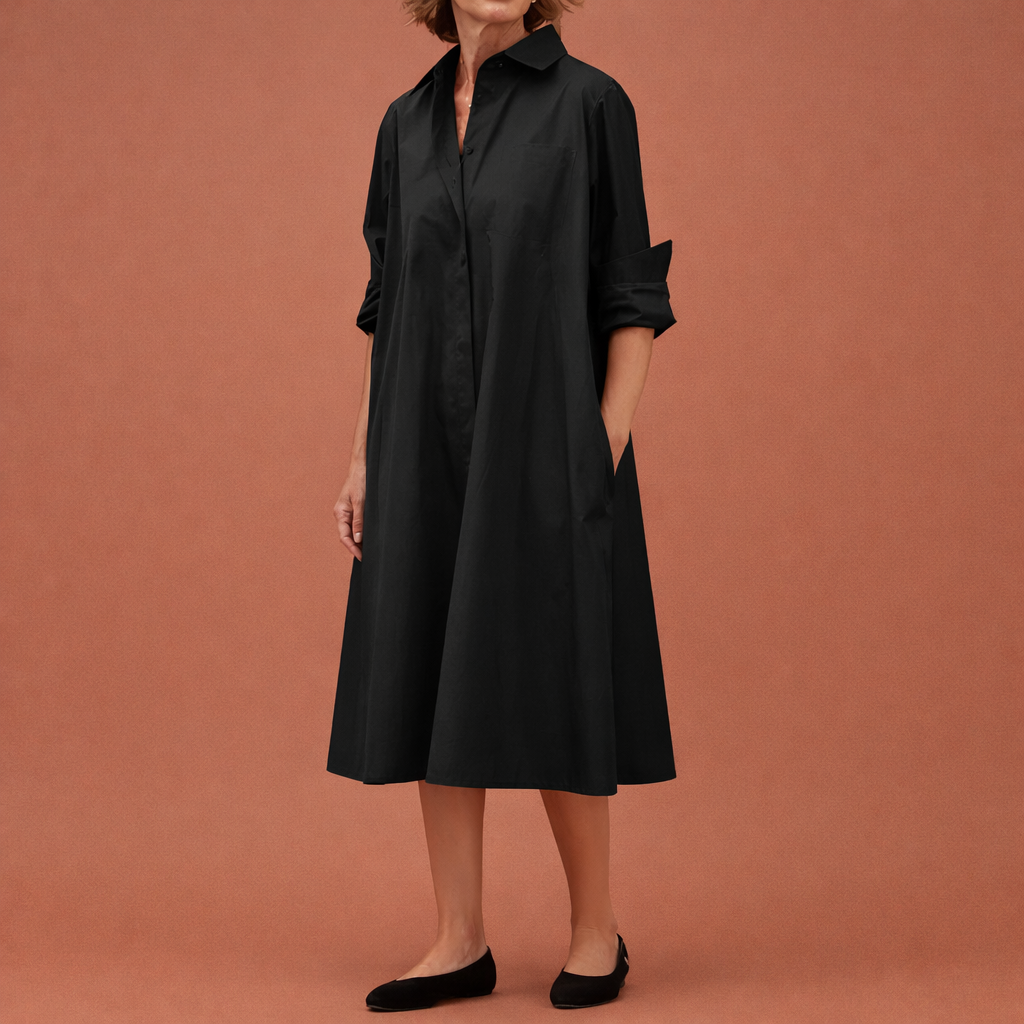 Dames midi blousejurk in zwart met minimalistisch design, zacht en comfortabel voor casual en stijlvolle outfits.
