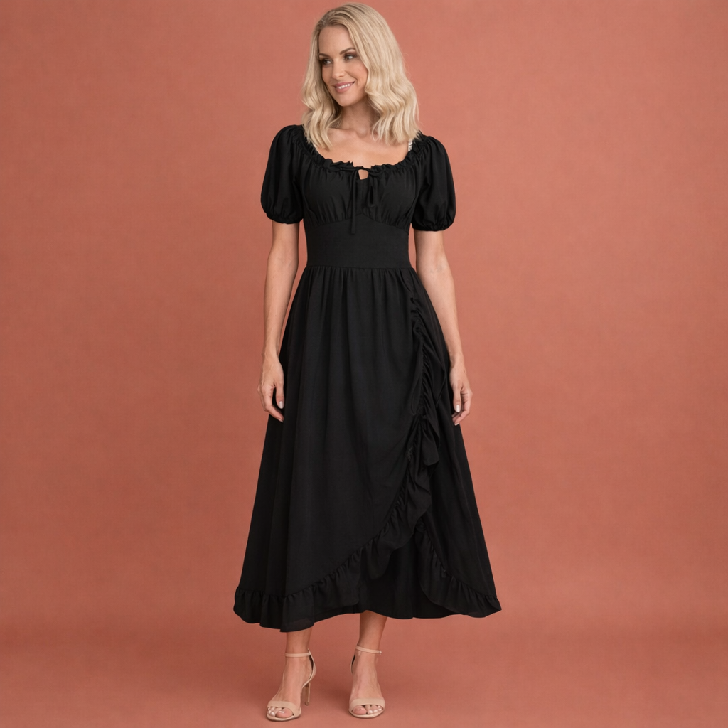 Dames midi jurk in zwart met minimalistisch design, zacht en comfortabel voor casual en stijlvolle outfits.