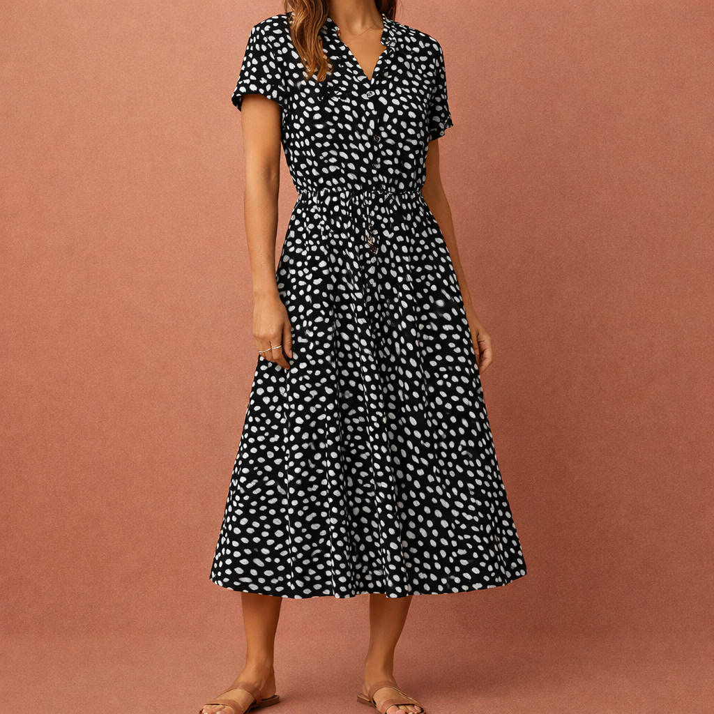 Dames midi jurk in zwart met minimalistisch design, zacht en comfortabel voor casual en stijlvolle outfits.