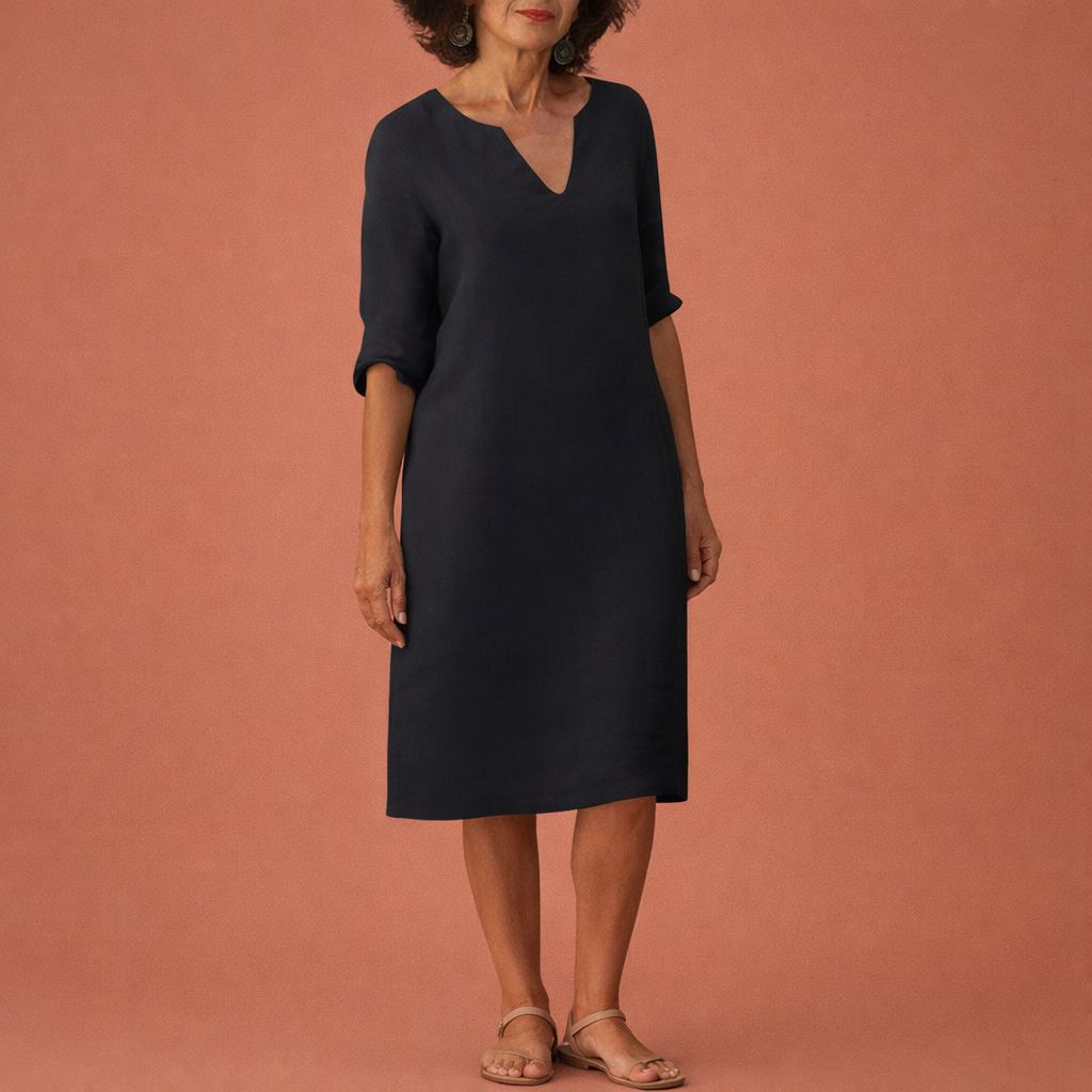Dames midi zomerjurk in zwart met minimalistisch design, zacht en comfortabel voor casual en stijlvolle outfits.