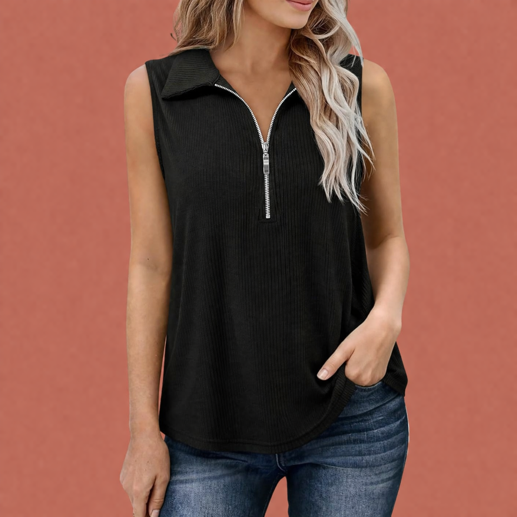 Dames polo top in zwart met minimalistisch design, zacht en comfortabel voor casual en stijlvolle outfits.