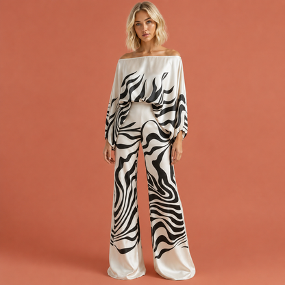 Dames satijnen tweedelige set in zwart met minimalistisch design, zacht en comfortabel voor casual en stijlvolle outfits.