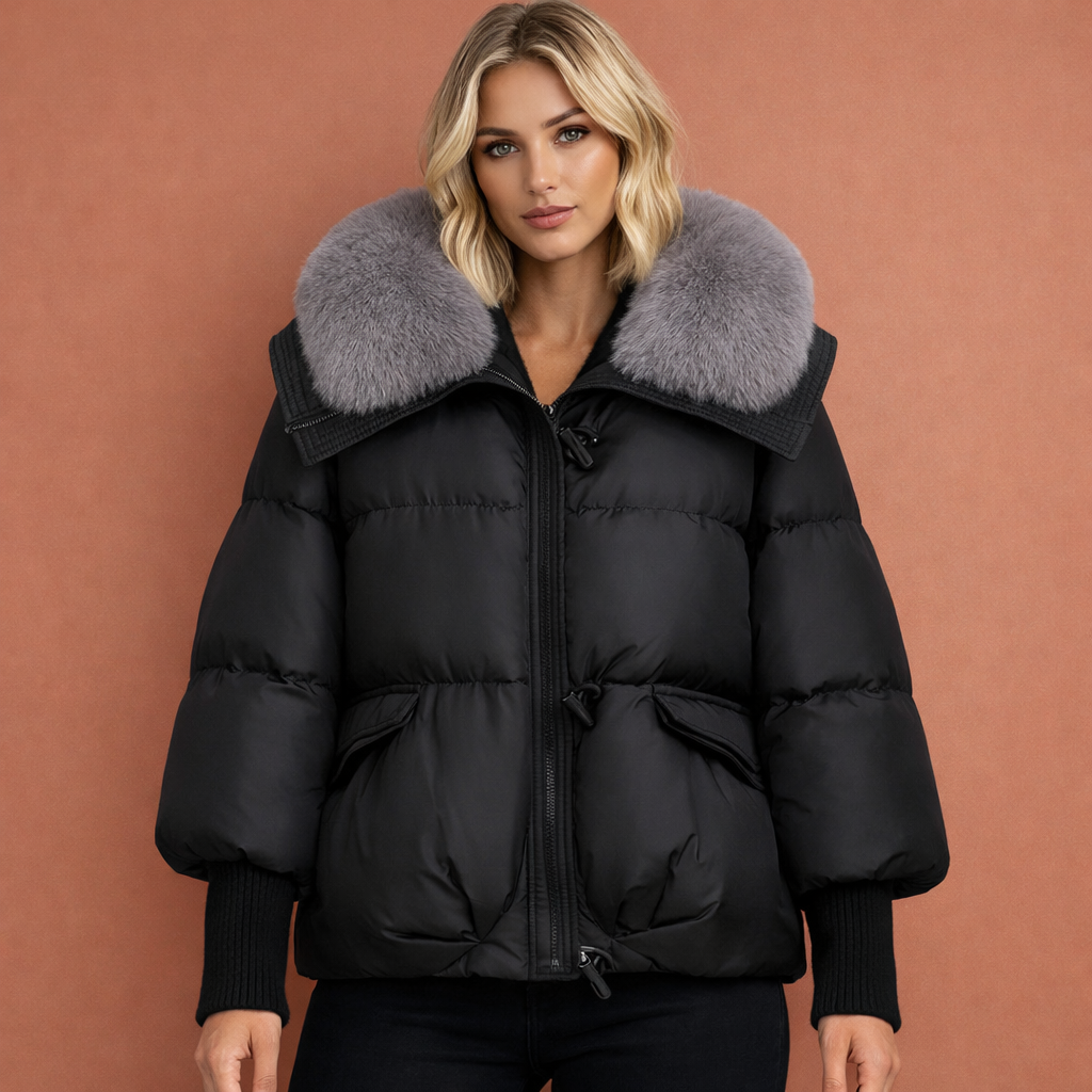 Zwarte dames winterjas met elegante kraag en comfortabele pasvorm, ideaal voor koude dagen en dagelijks gebruik.1