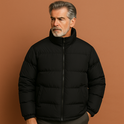 Zwarte heren pufferjas met moderne pasvorm en warme gewatteerde afwerking, ideaal voor koude dagen.