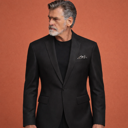 Zwarte herenjas met reverskraag en klepzakken, geschikt voor dagelijks gebruik en nette outfits.