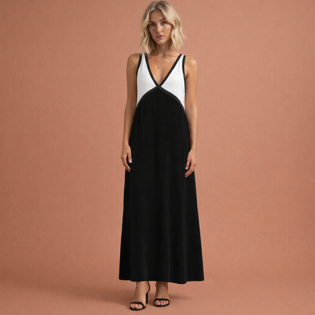 Zwarte lange mouwloze damesjurk met V-hals en comfortabele pasvorm, ideaal voor zomerse dagen en casual gelegenheden.