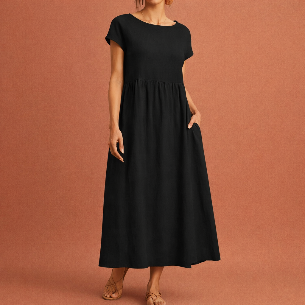 Dames midi jurk in zwart met minimalistisch design, zacht en comfortabel voor casual en stijlvolle outfits.