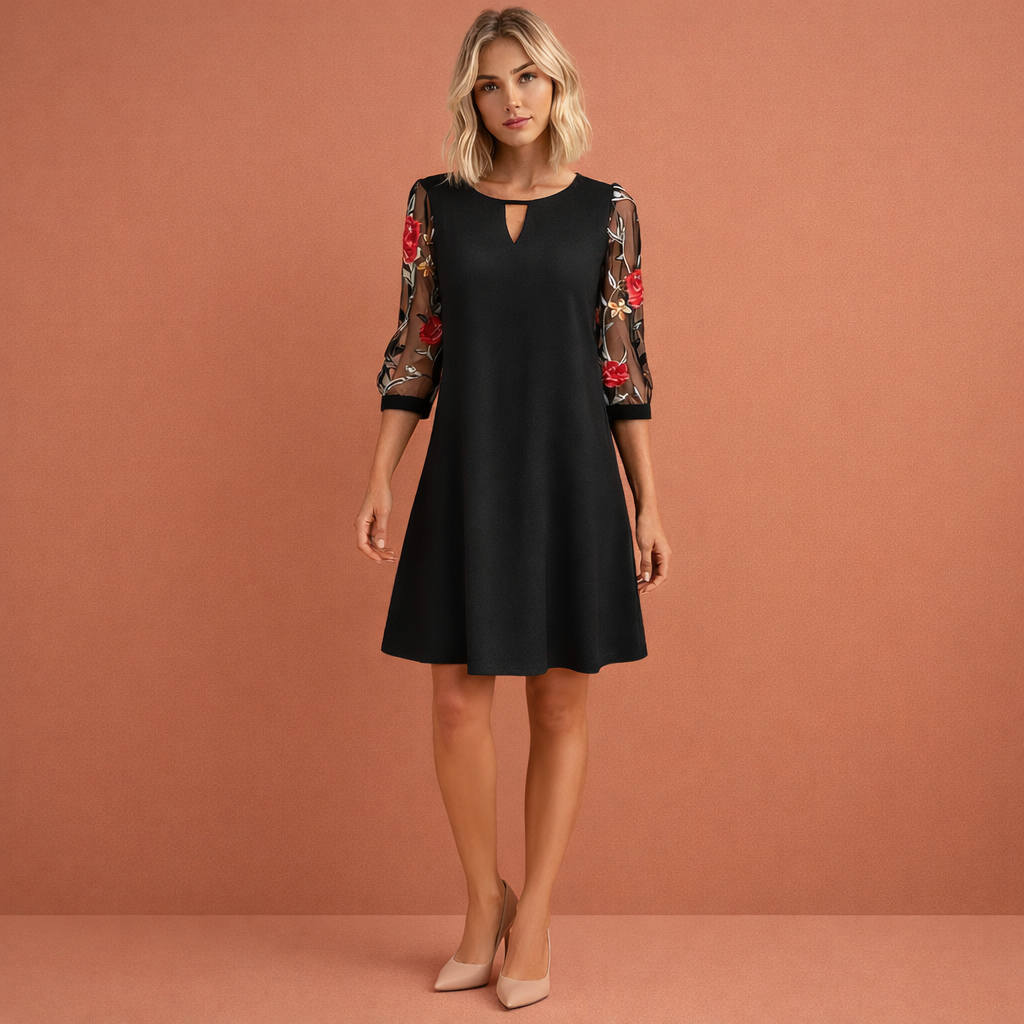 Zwarte mini jurk met florale mouwen voor dames, elegante en trendy jurk voor feest, diner of avondje uit.